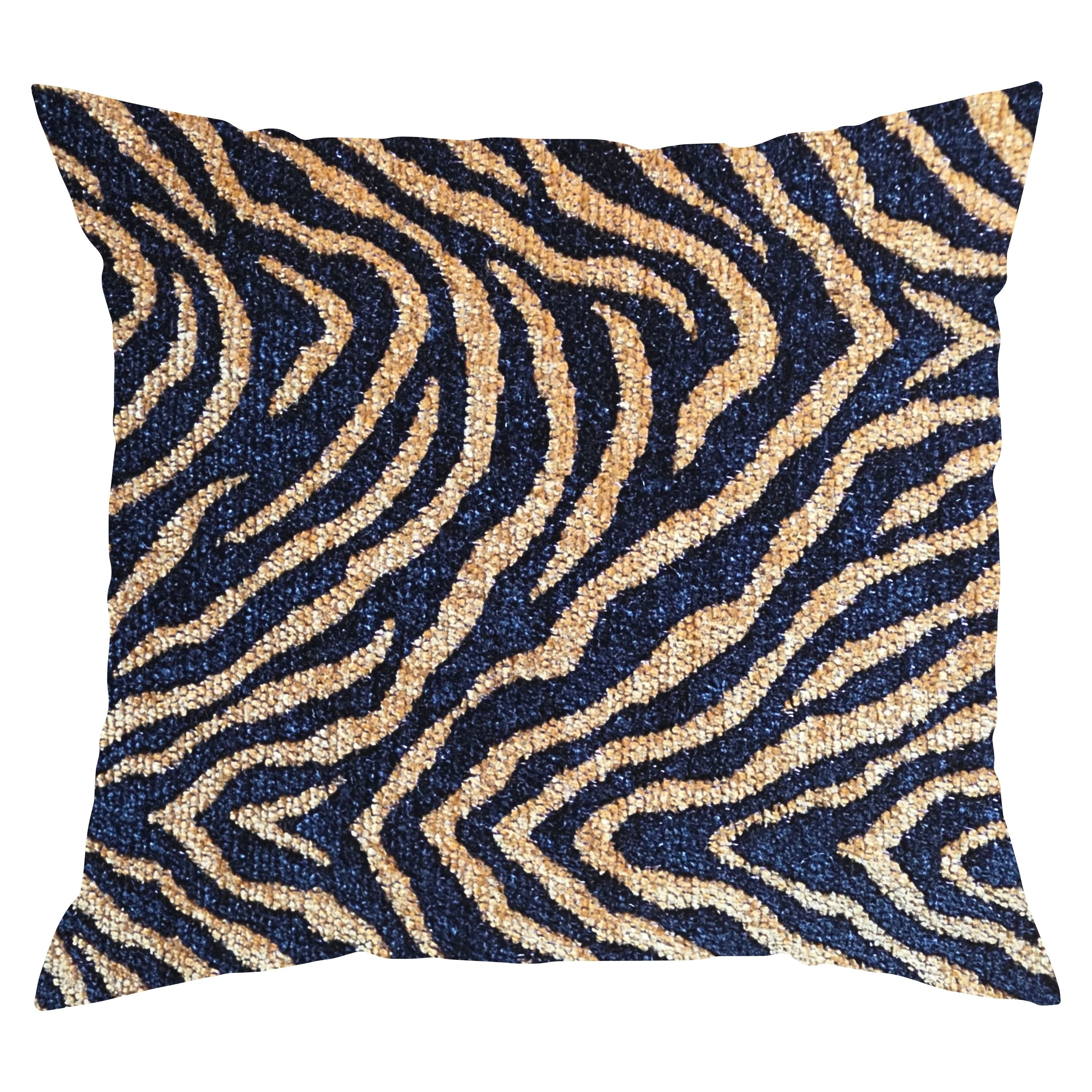Decorative pillow with zebra pattern in navy and beige on a white background