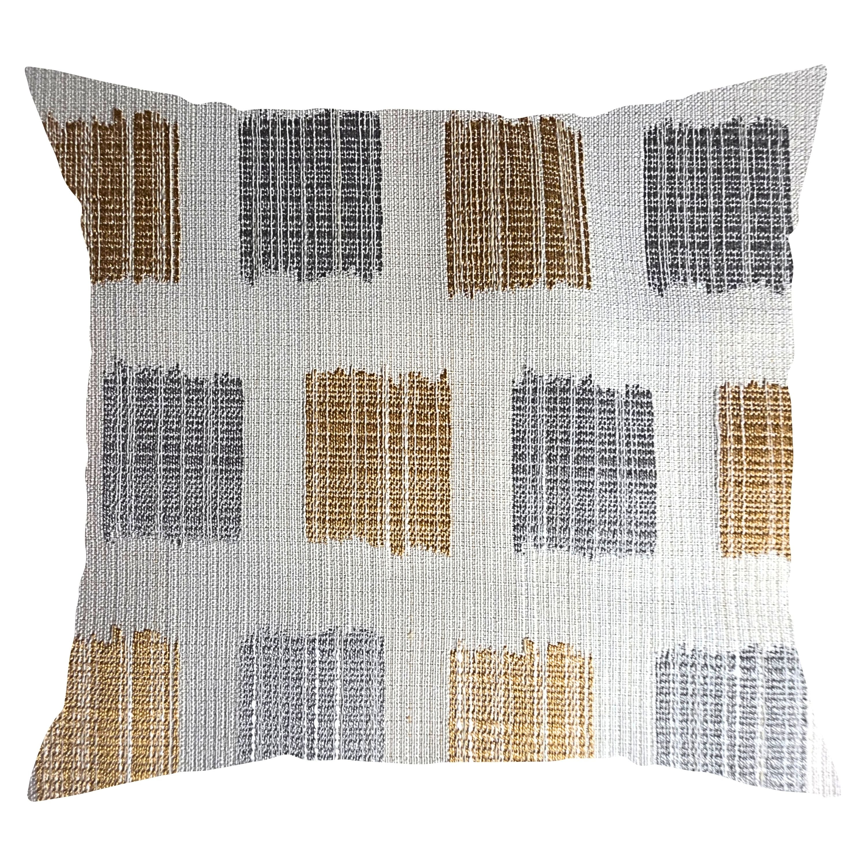 Decorative pillow with a geometric pattern on a white background