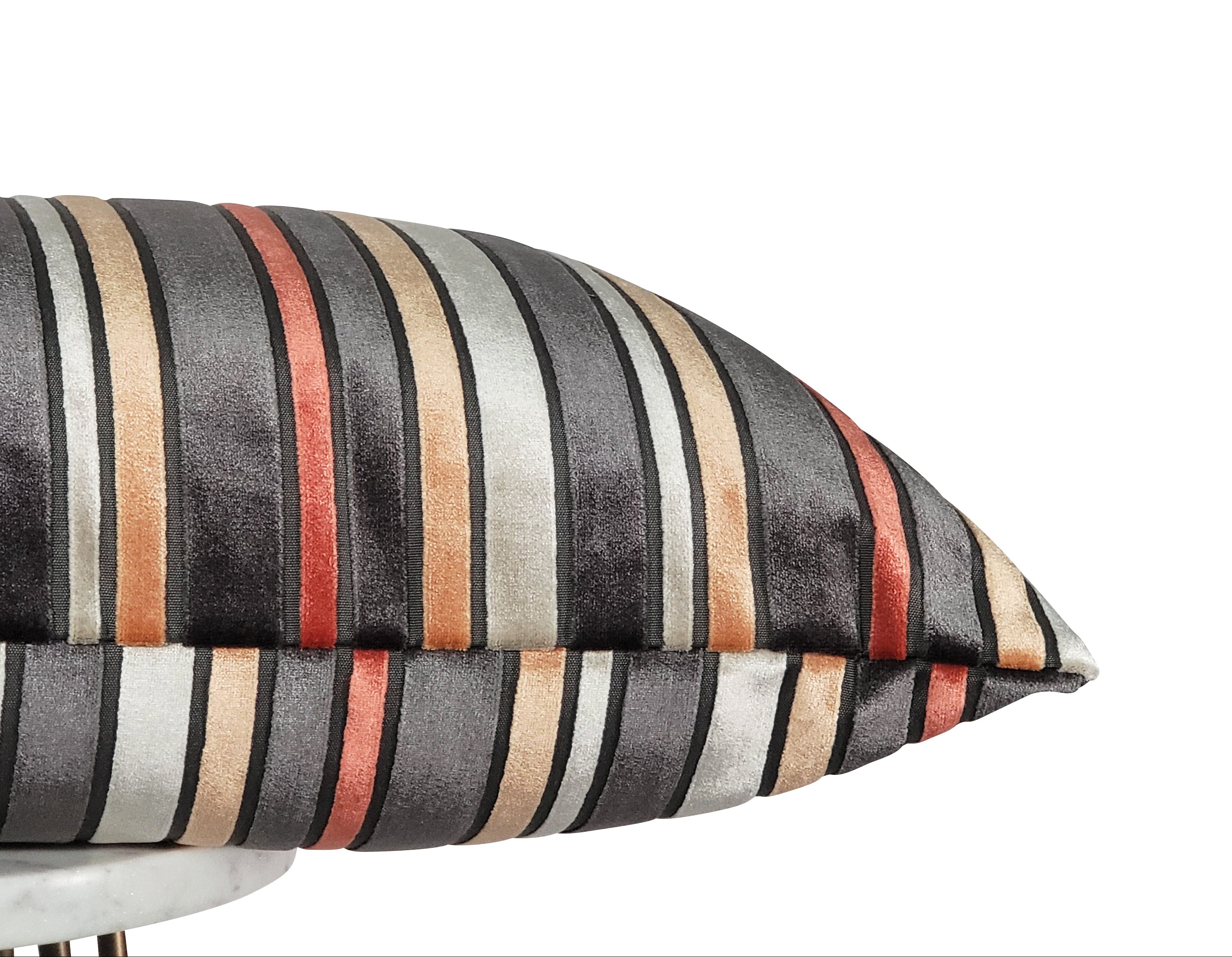 Orange and gray striped throw pillow styled | Makena Decor