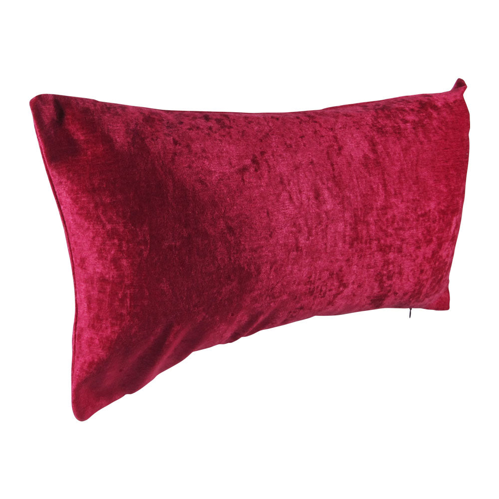 side-view of a shiny velvet hot pink 13x21 rectangle throw pillow.