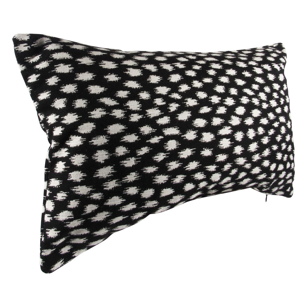 Black and white spotted lumbar pillow cover, by Makena Decor.