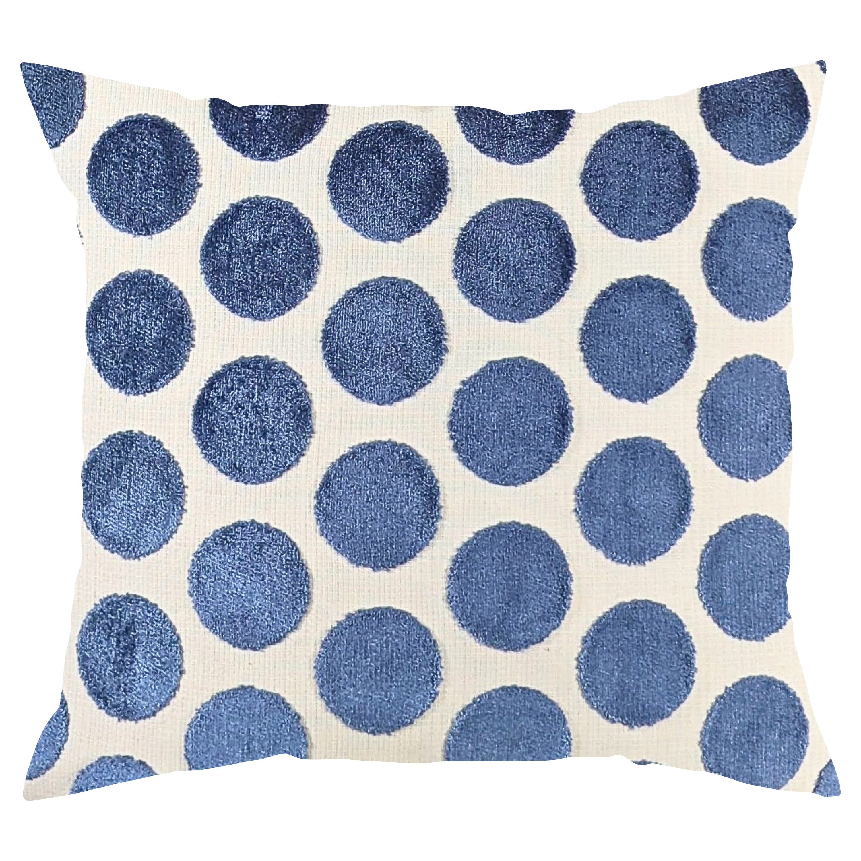 Pillow with blue polka dot pattern on a white background