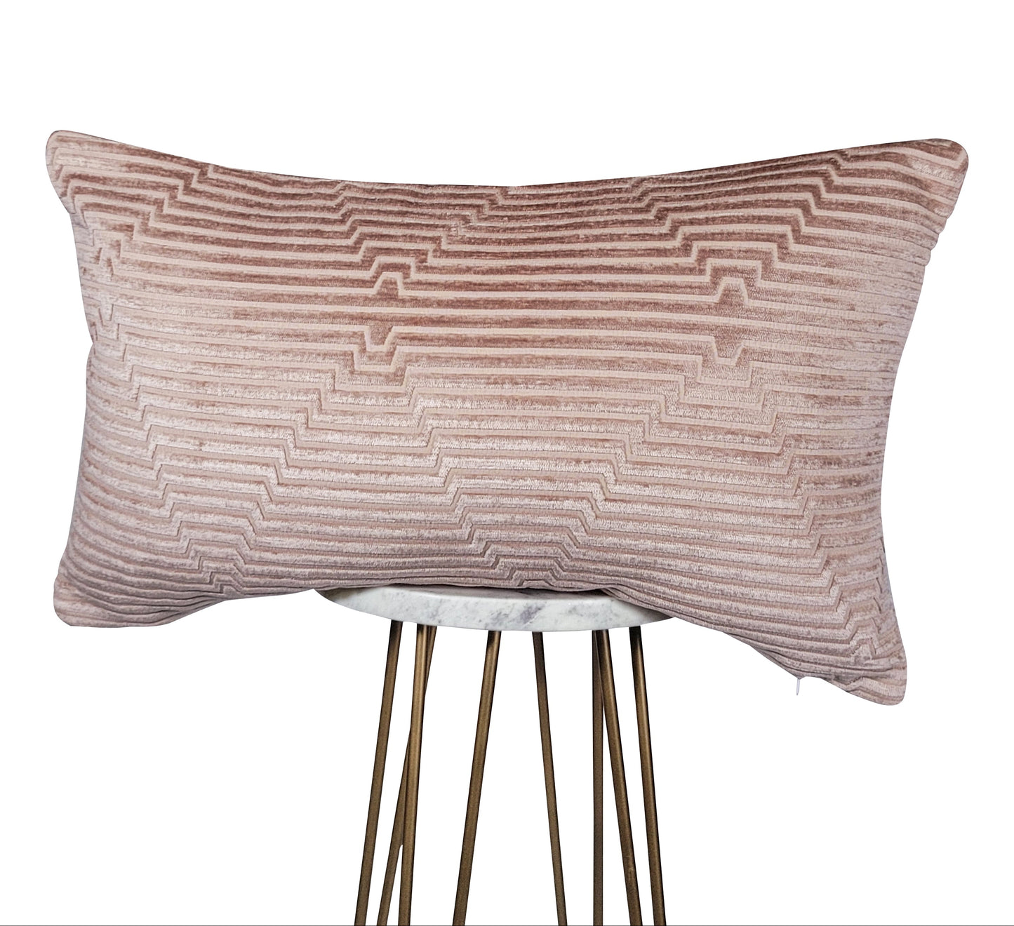 Textured pink pillow on a white background