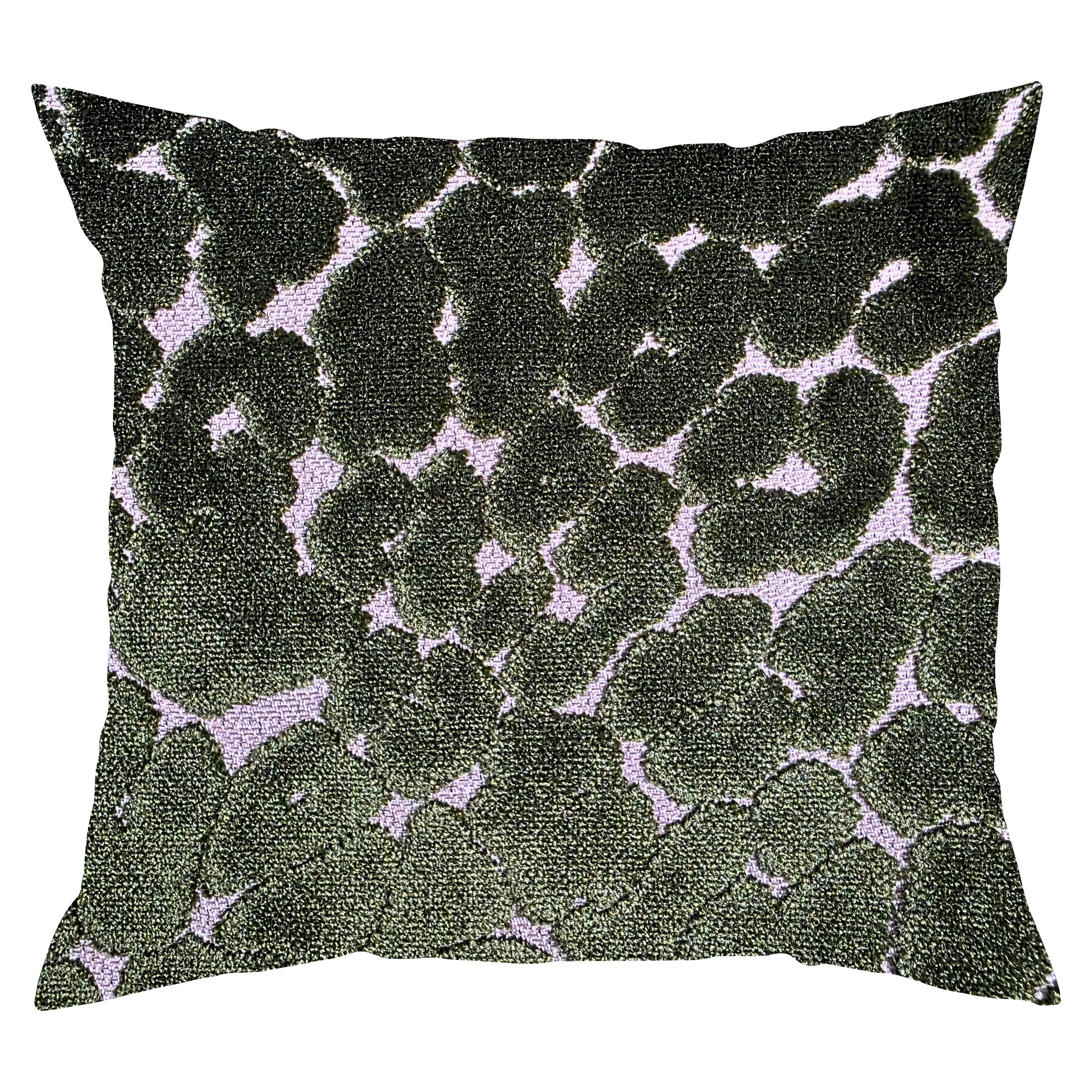 Decorative pillow with a black and white abstract pattern on a white background