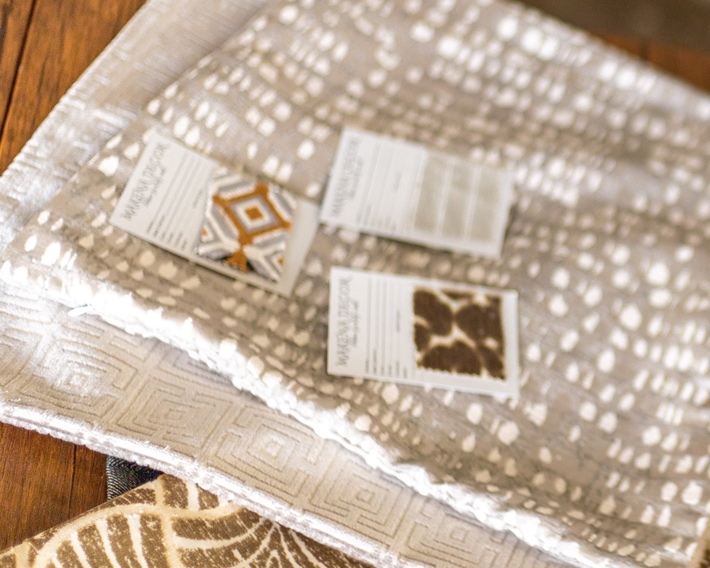 textured fabric sample at a table