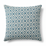 A square-shaped throw pillow with a geometric pattern, featuring teal blue diamond shapes on a beige background, with a textured appearance.