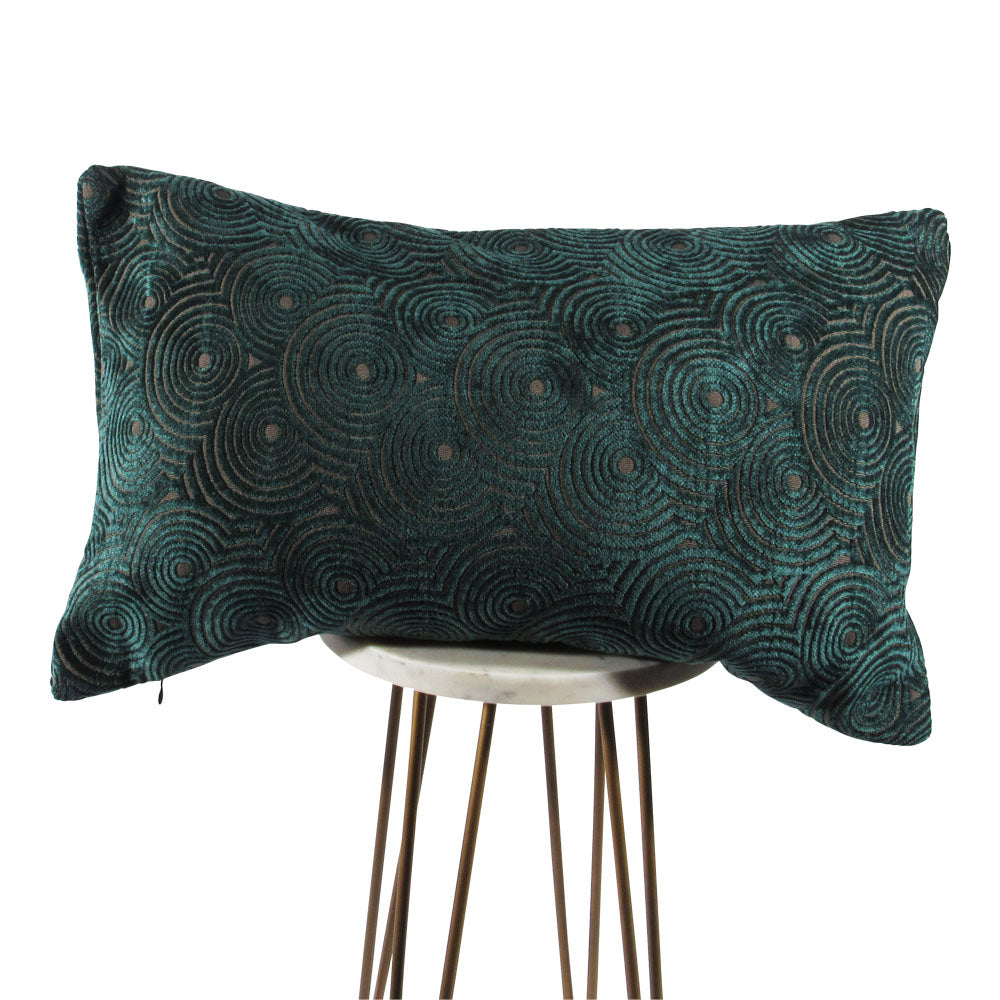 velvet forest green 13x21 rectangle throw pillow with circle designs throughout, displayed on small white table.