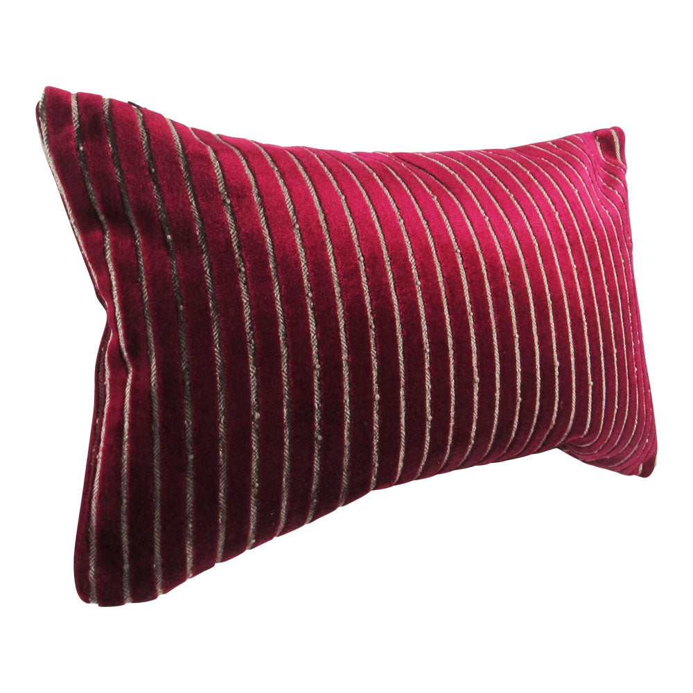 shiny fuchsia 13x21 rectangle throw pillow with indented lines throughout.