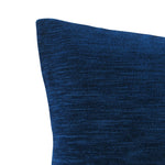 up close corner view of royal blue chenille throw pillow