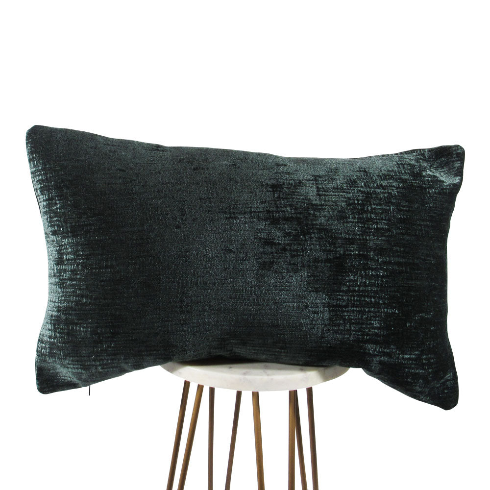 shiny velvet forest green 13x21 rectangle throw pillow, displayed on small white table.