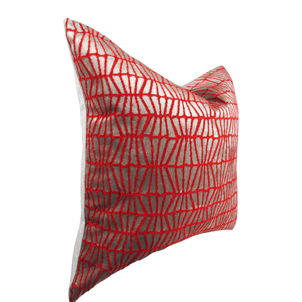 side-view of a bright orange and silver 20x20 throw pillow with slanted lines