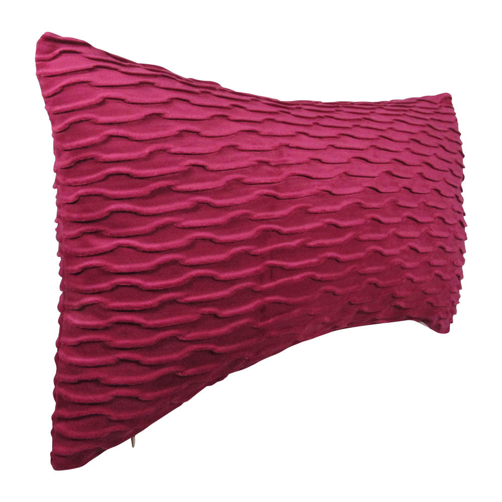 side-view of a fuchsia 13x21 rectangle throw pillow with wavy indented lines throughout.