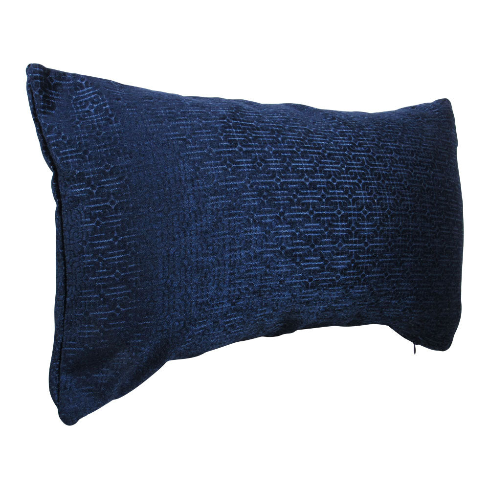 sideview of a shiny royal blue lumbar throw pillow with geometric designs throughout.