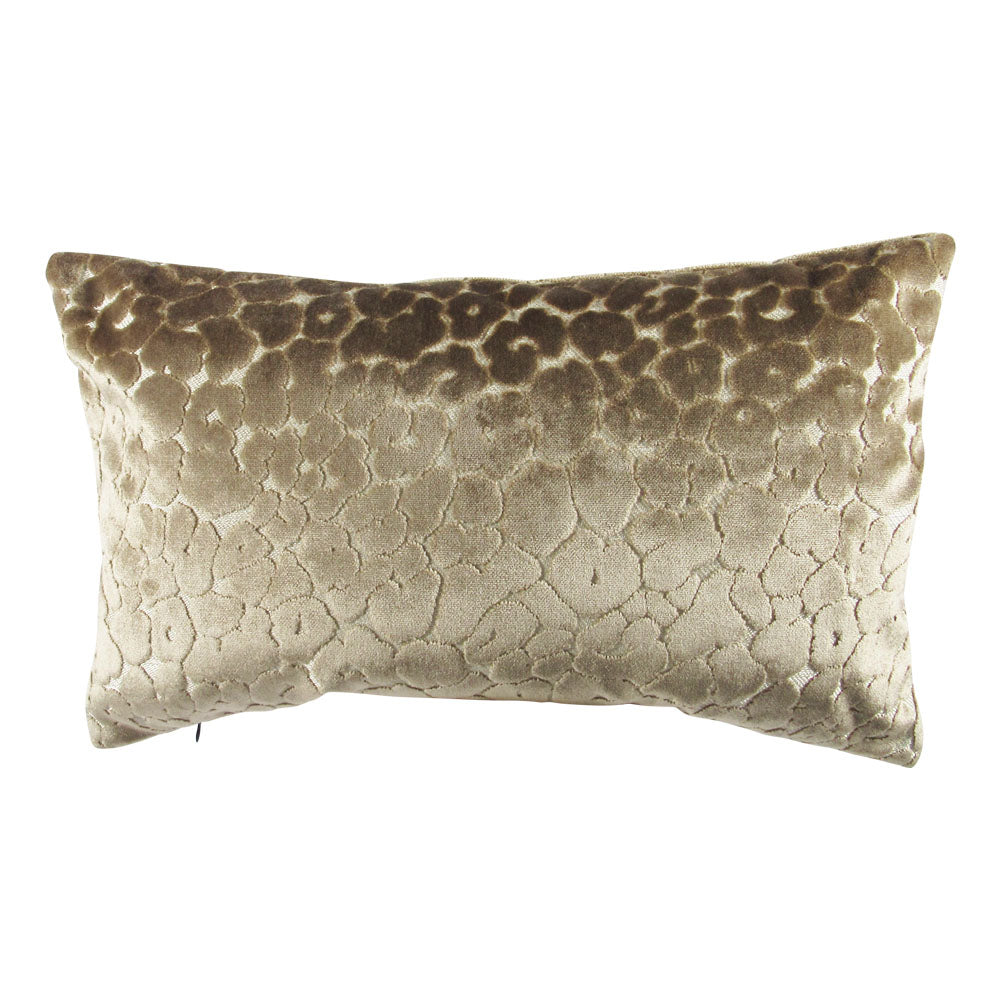 A rectangular throw pillow with a tan animal print on a velvet fabric.